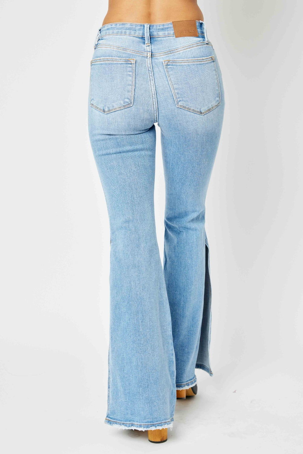 Judy Blue Full Size Mid Rise Raw Hem Slit Flare Jeans - Premium  - Just $78.88! Shop now at Nine Thirty Nine Design