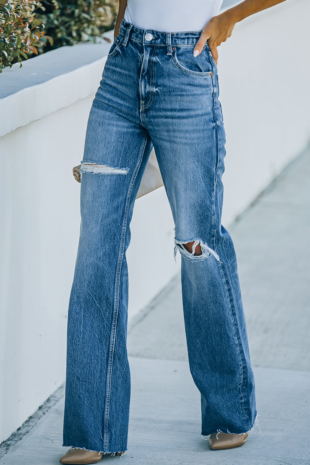 High-Rise Distressed Raw Hem Jeans - Premium Jeans - Just $64! Shop now at Nine Thirty Nine Design