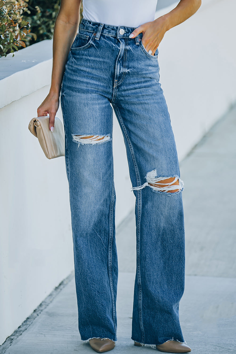 High-Rise Distressed Raw Hem Jeans - Premium Jeans - Just $64! Shop now at Nine Thirty Nine Design